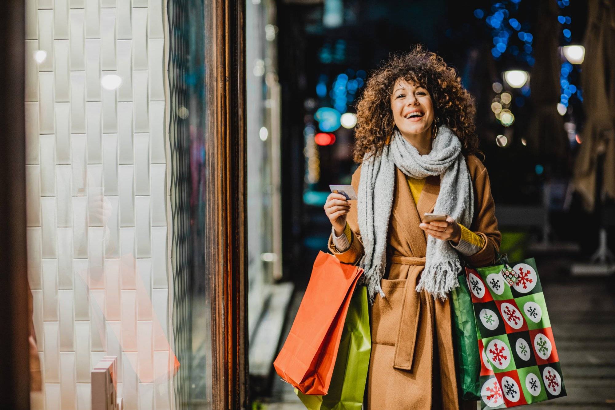 Young woman shopping for Christmas Young woman shopping for Christmas